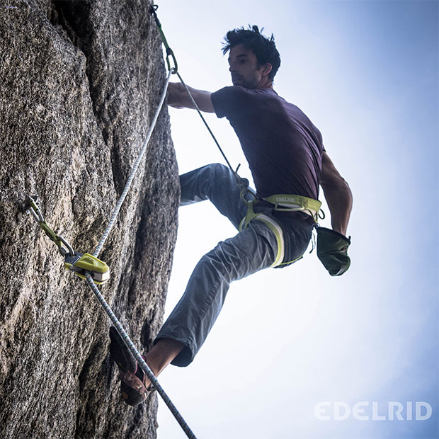 man climbing rock with edelrid equipment